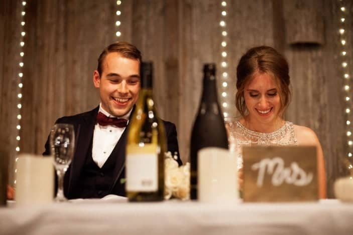 bride and groom sitting beside eachother