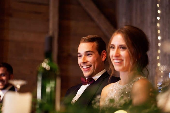 bride and groom smiling