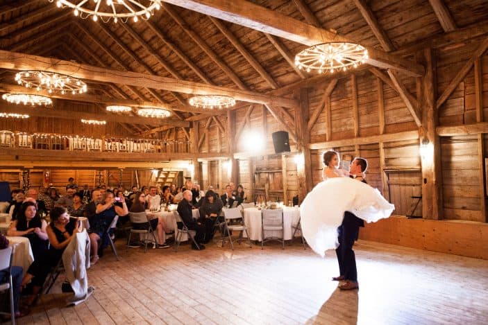 groom holding bride during first dance