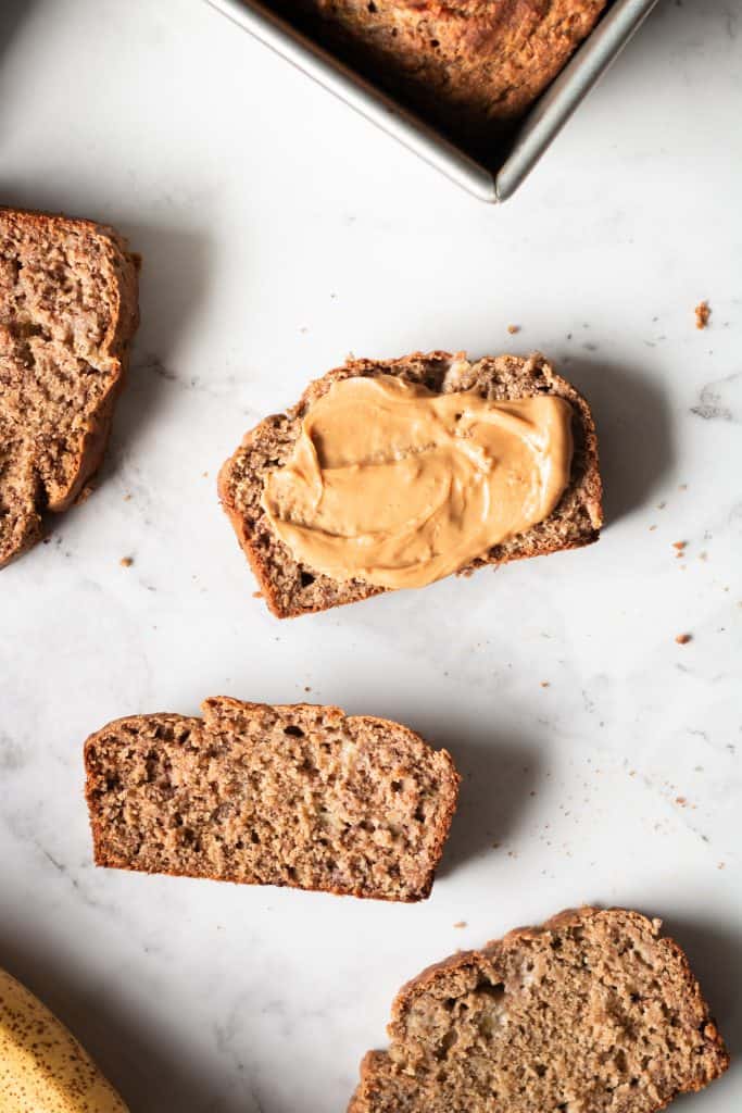 banana bread slices with peanut butter - february coffee break