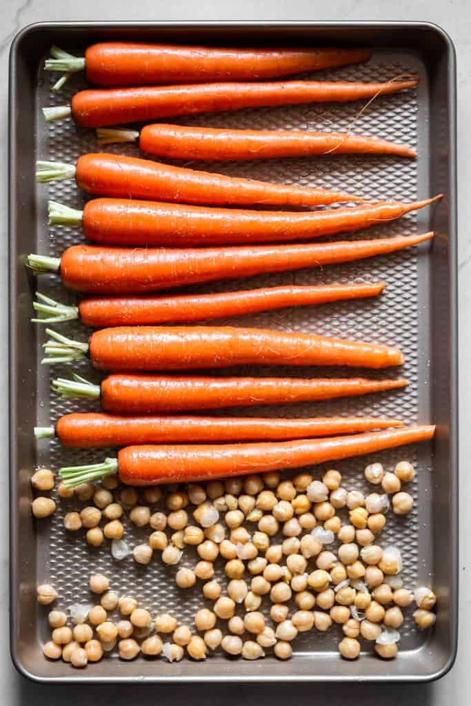 carrots and chickpeas on a pan