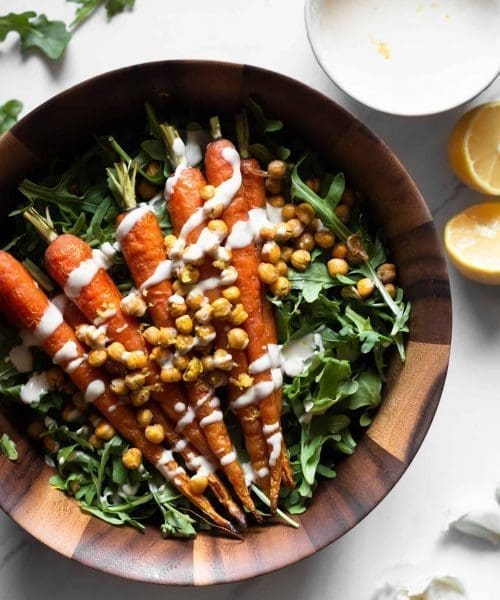 carrot and arugula salad in bowl