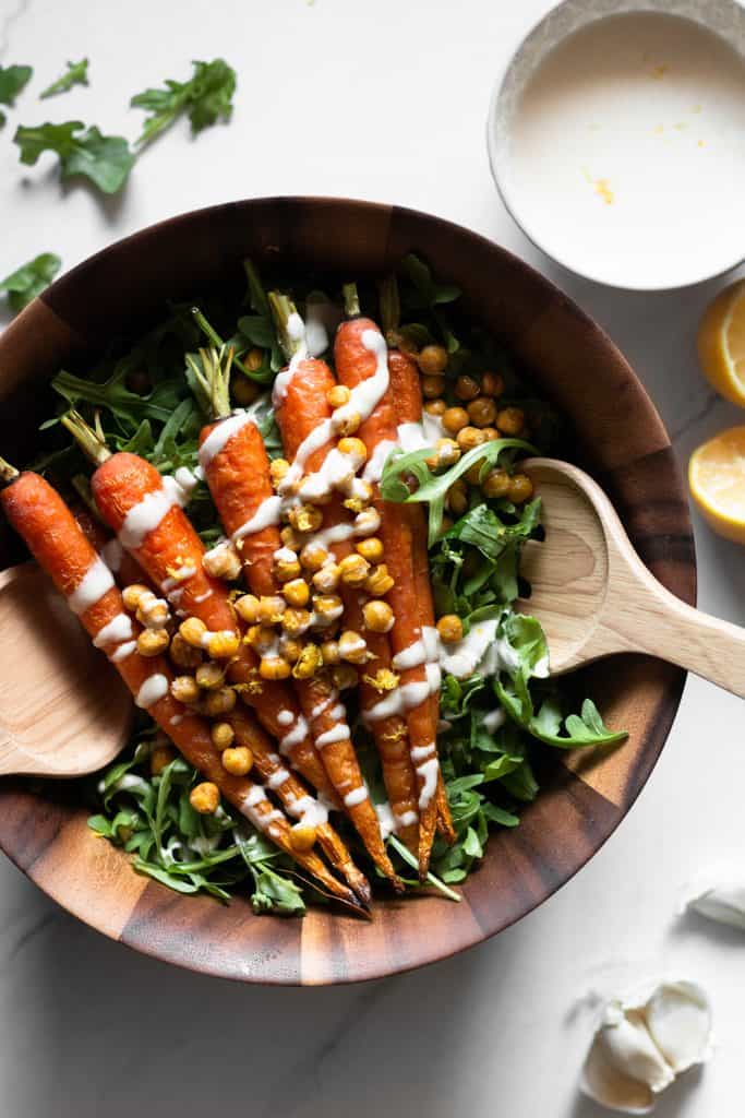 carrot and arugula salad in a bowl