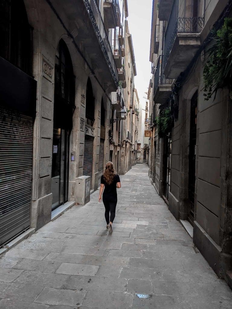 Girl walking in empty street