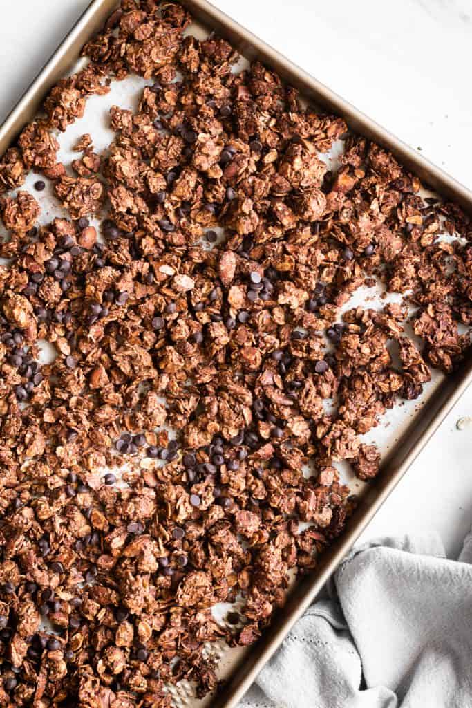chocolate almond granola on a baking sheet from the top