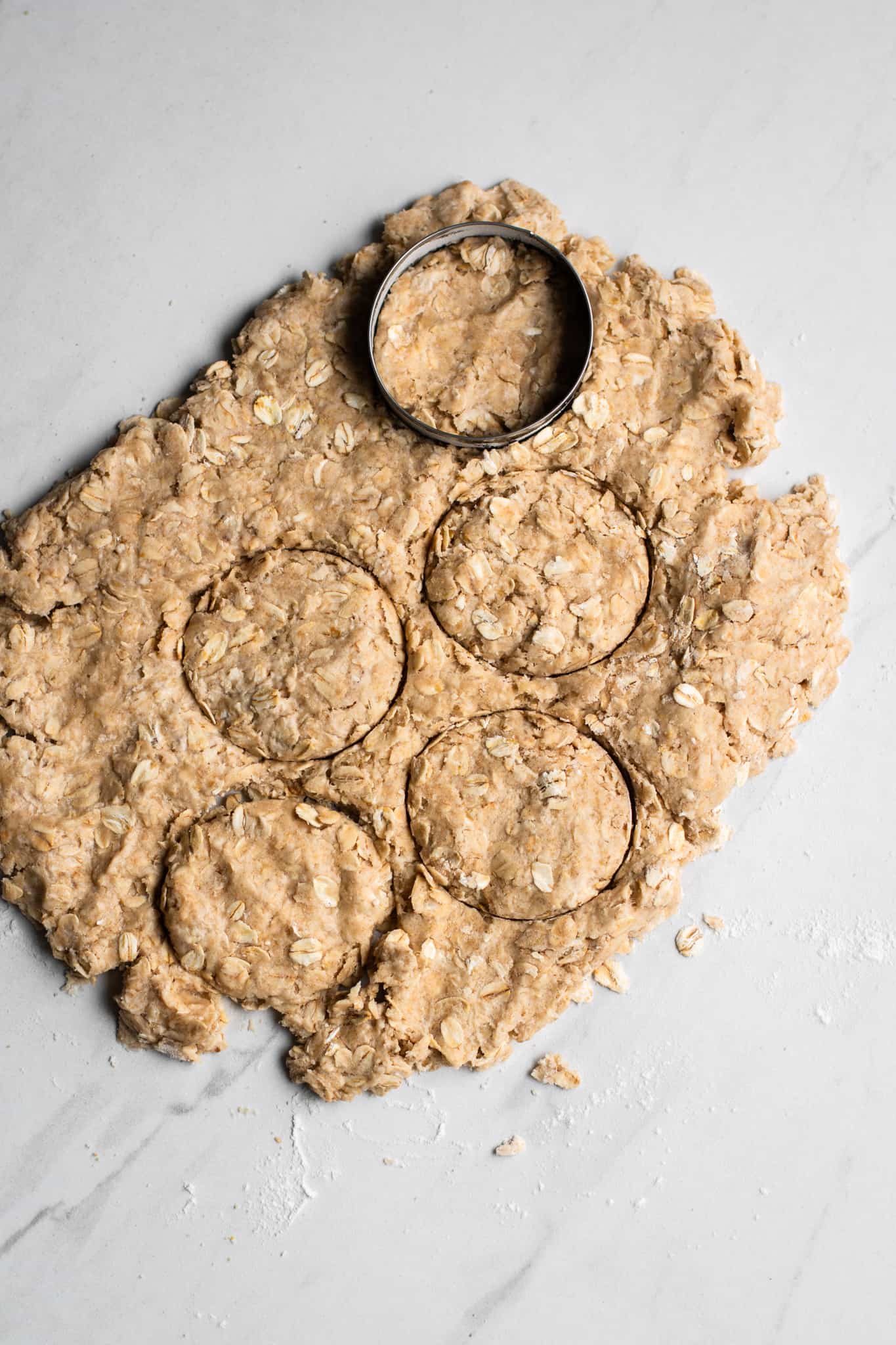 oatcake dough with cookie cutter