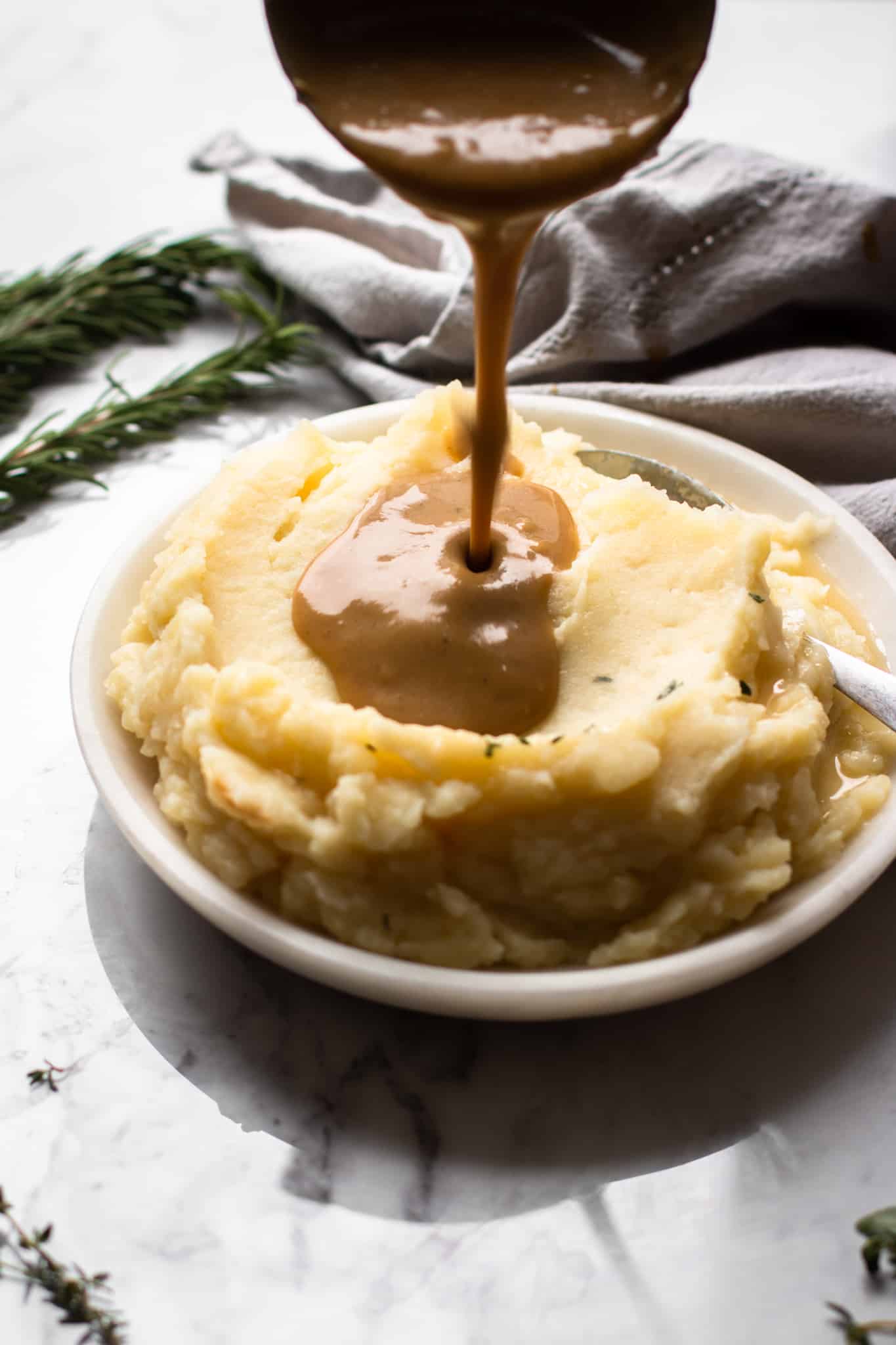 gravy poured on mashed potatoes