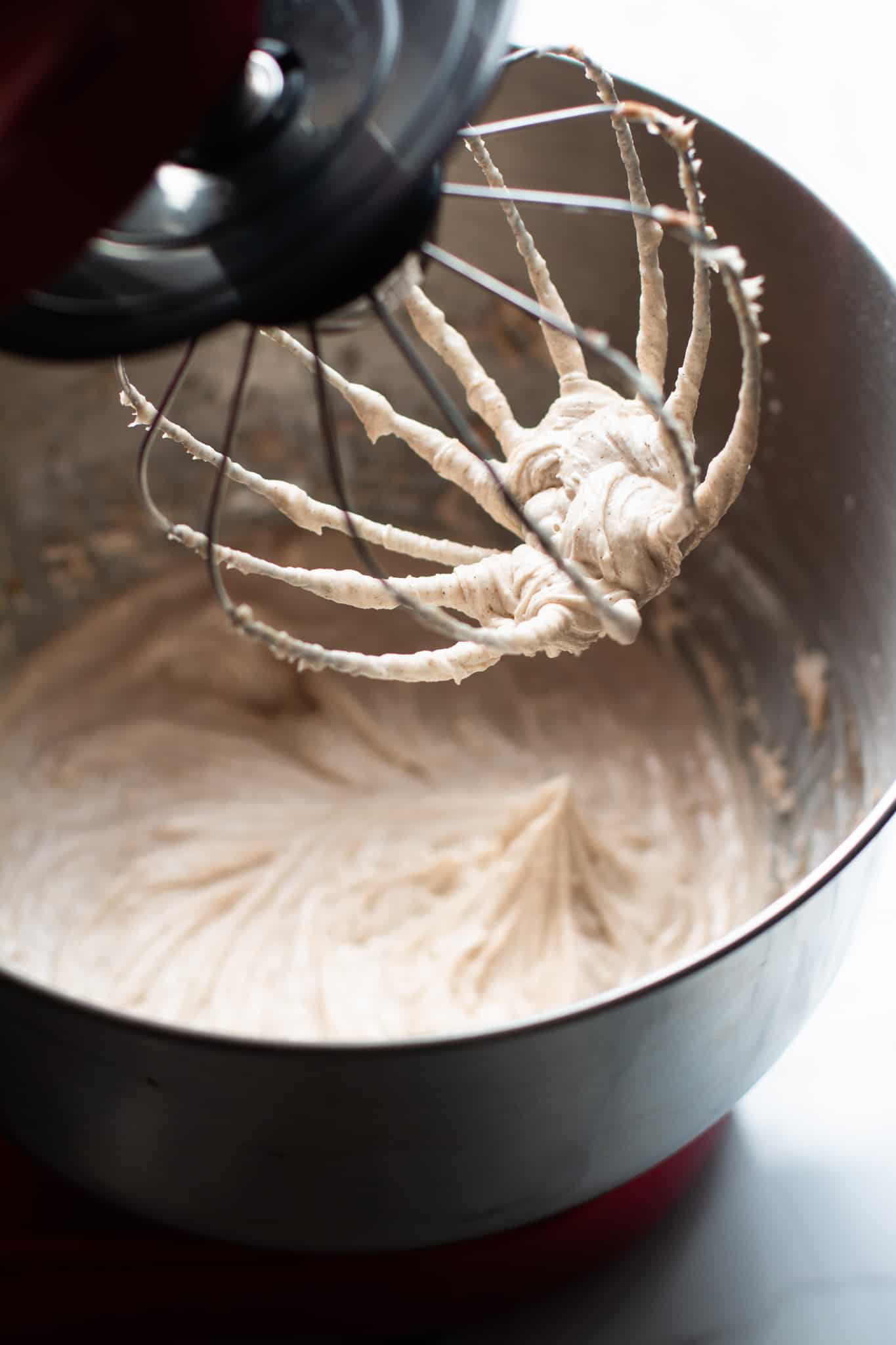 buttercream frosting in stand mixer bowl