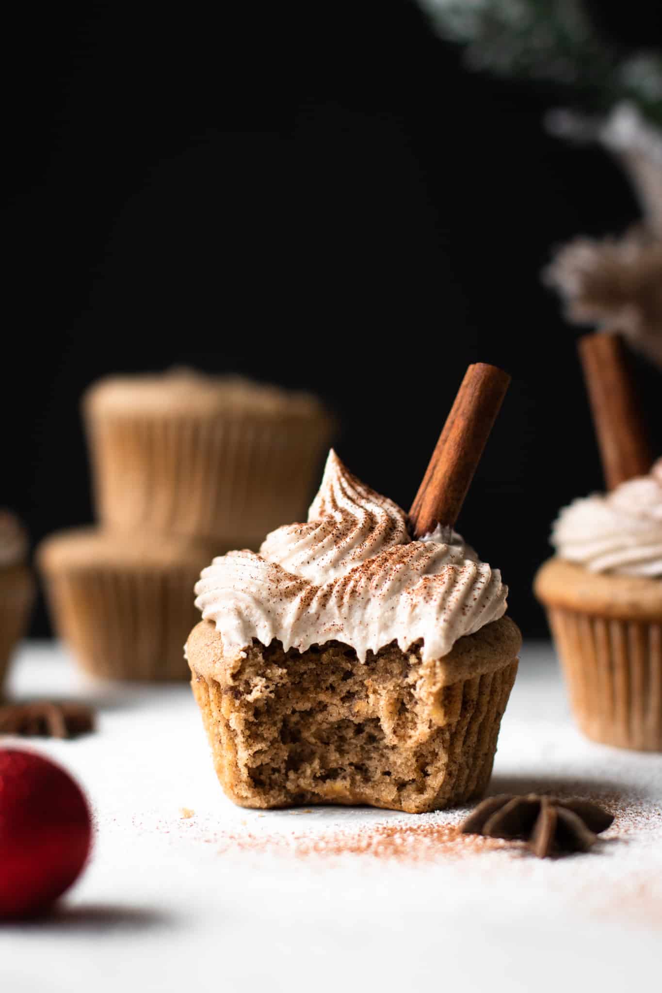 vegan chai cupcake with bite taken