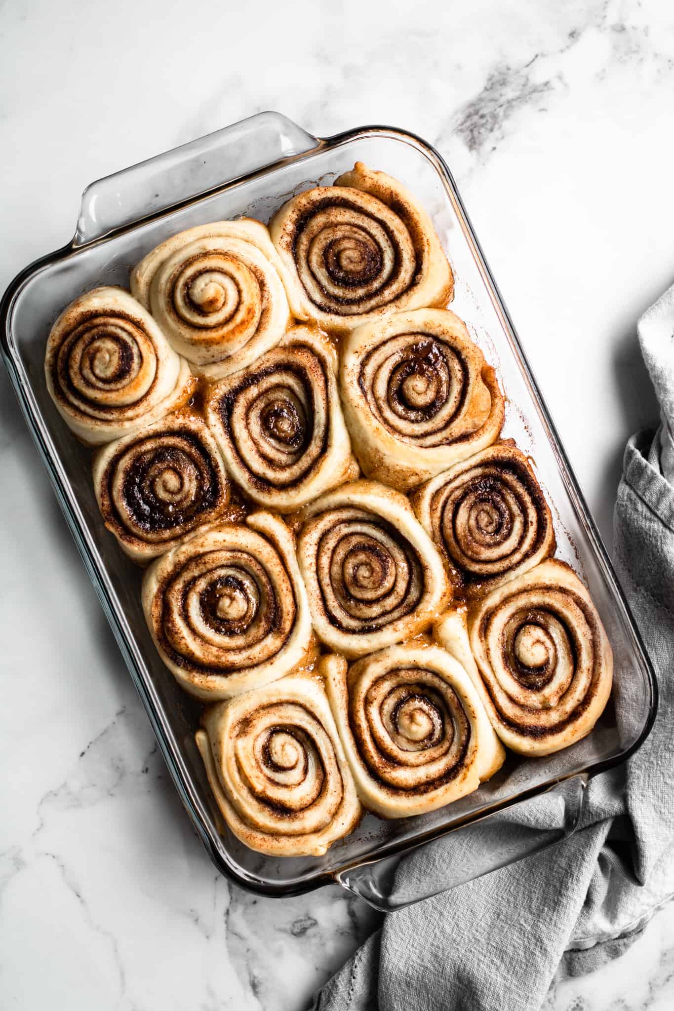 Baked cinnamon rolls in a glass dish