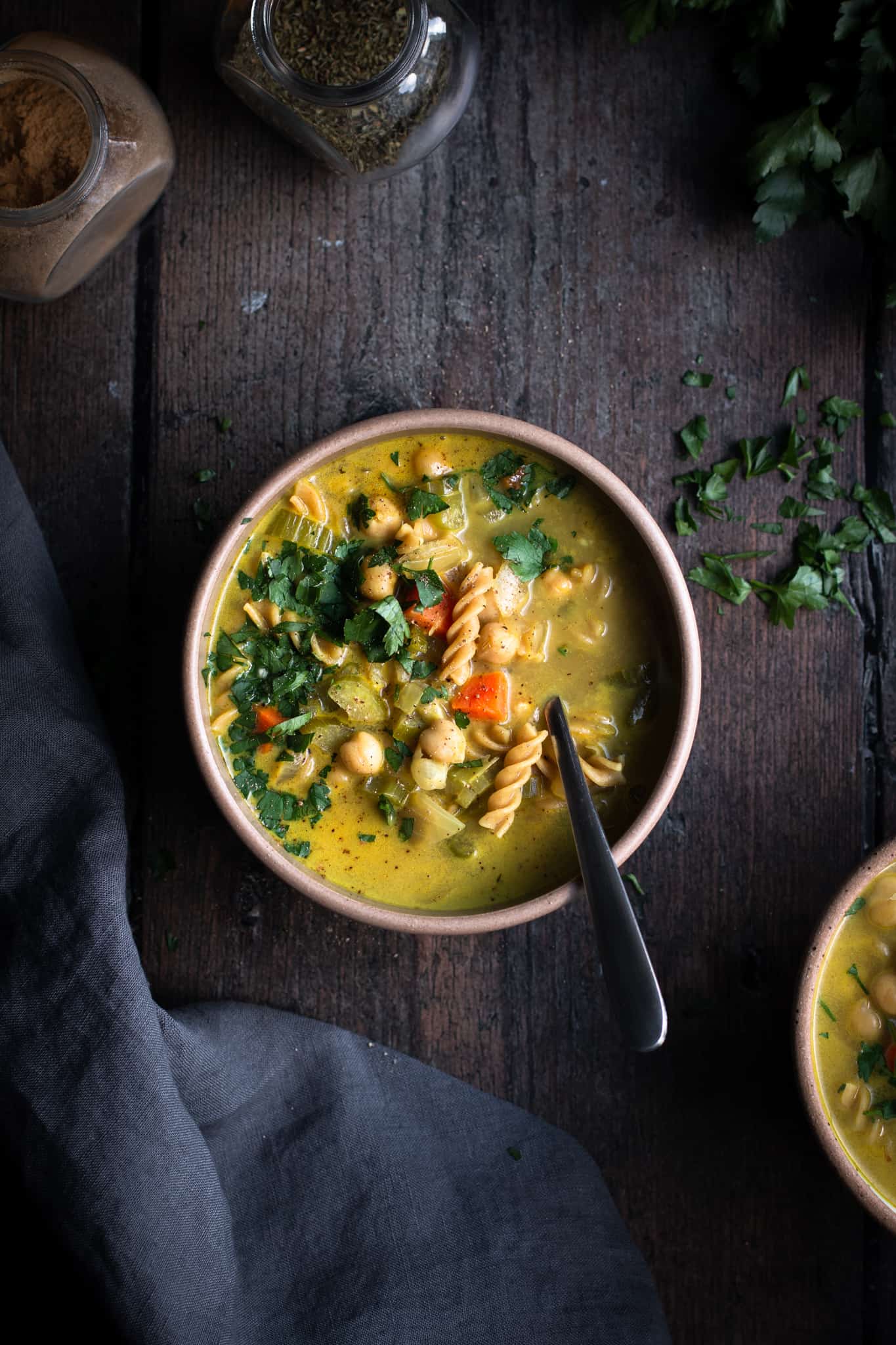 creamy chickpea noodle soup in a bowl