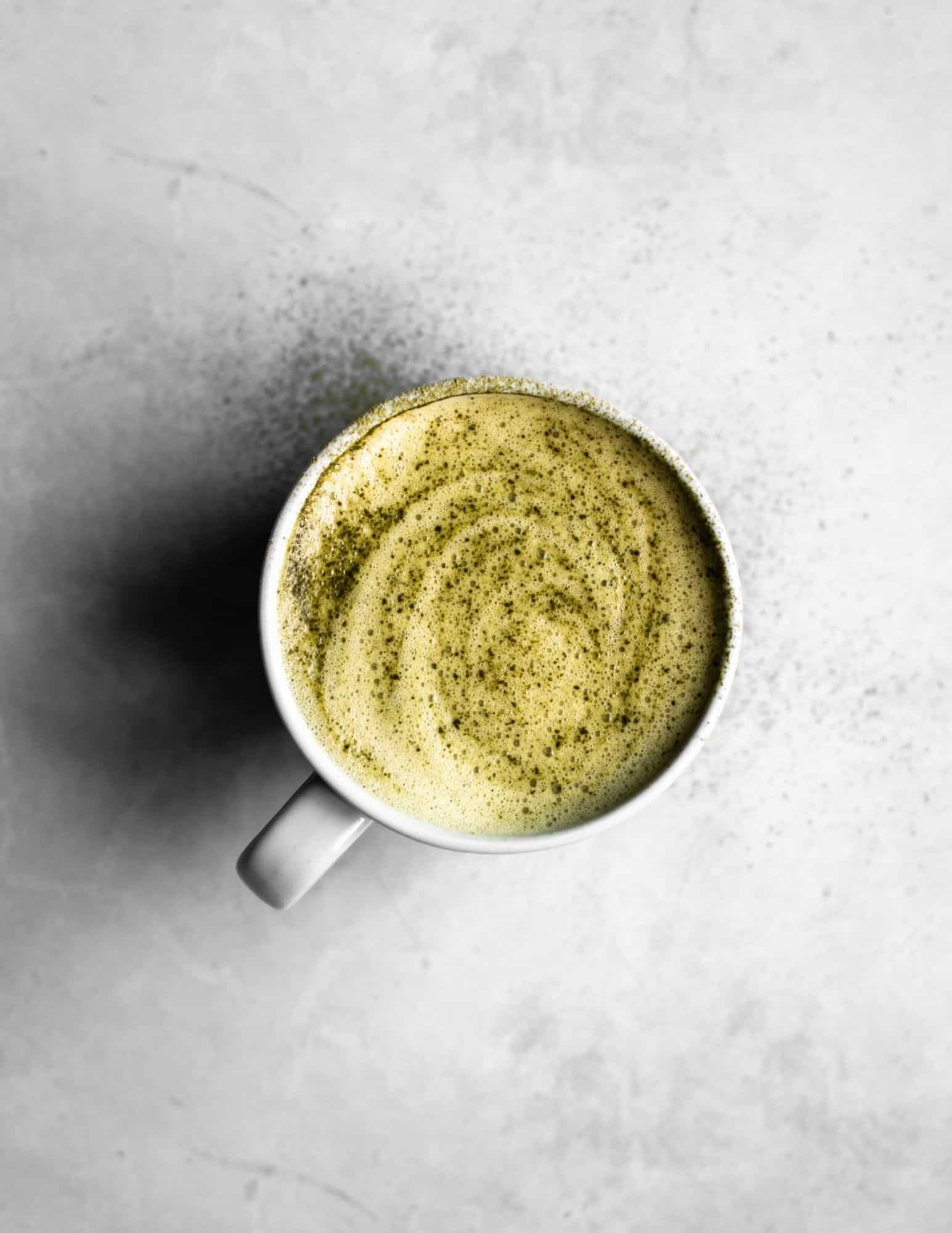 matcha latte in a mug seen from the top