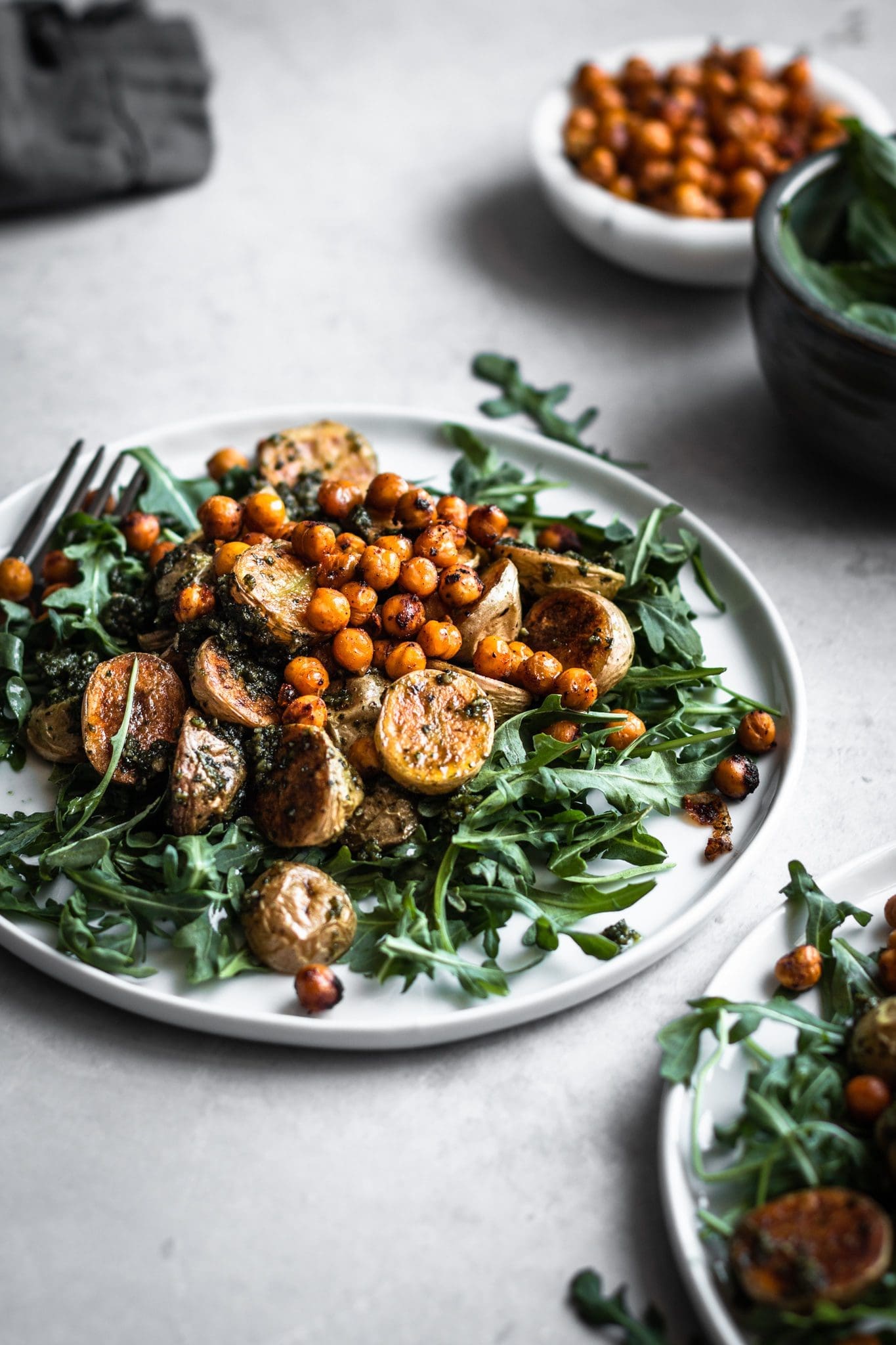 roasted potato pesto salad in a place