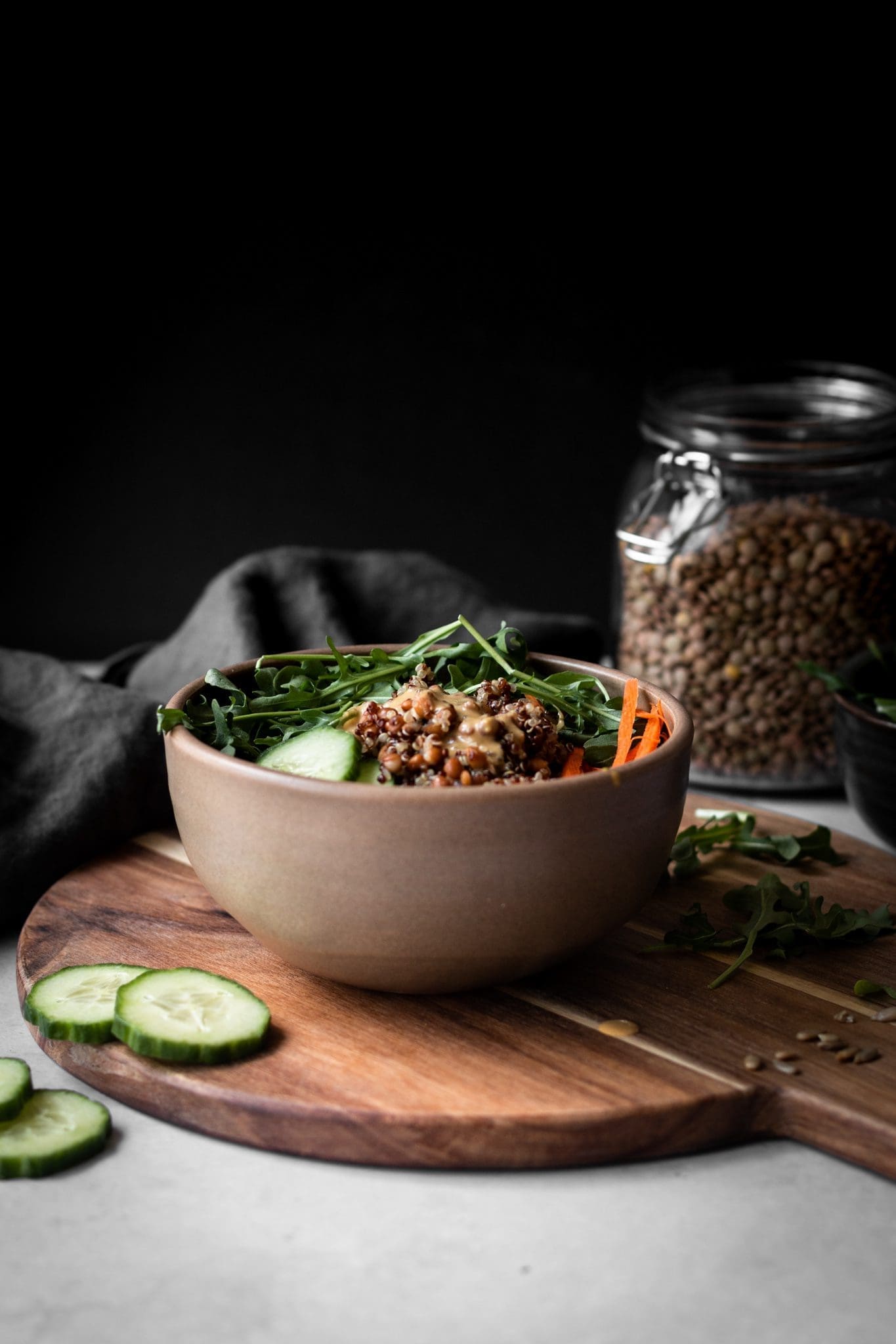 lentil quinoa salad in a bowl from the side