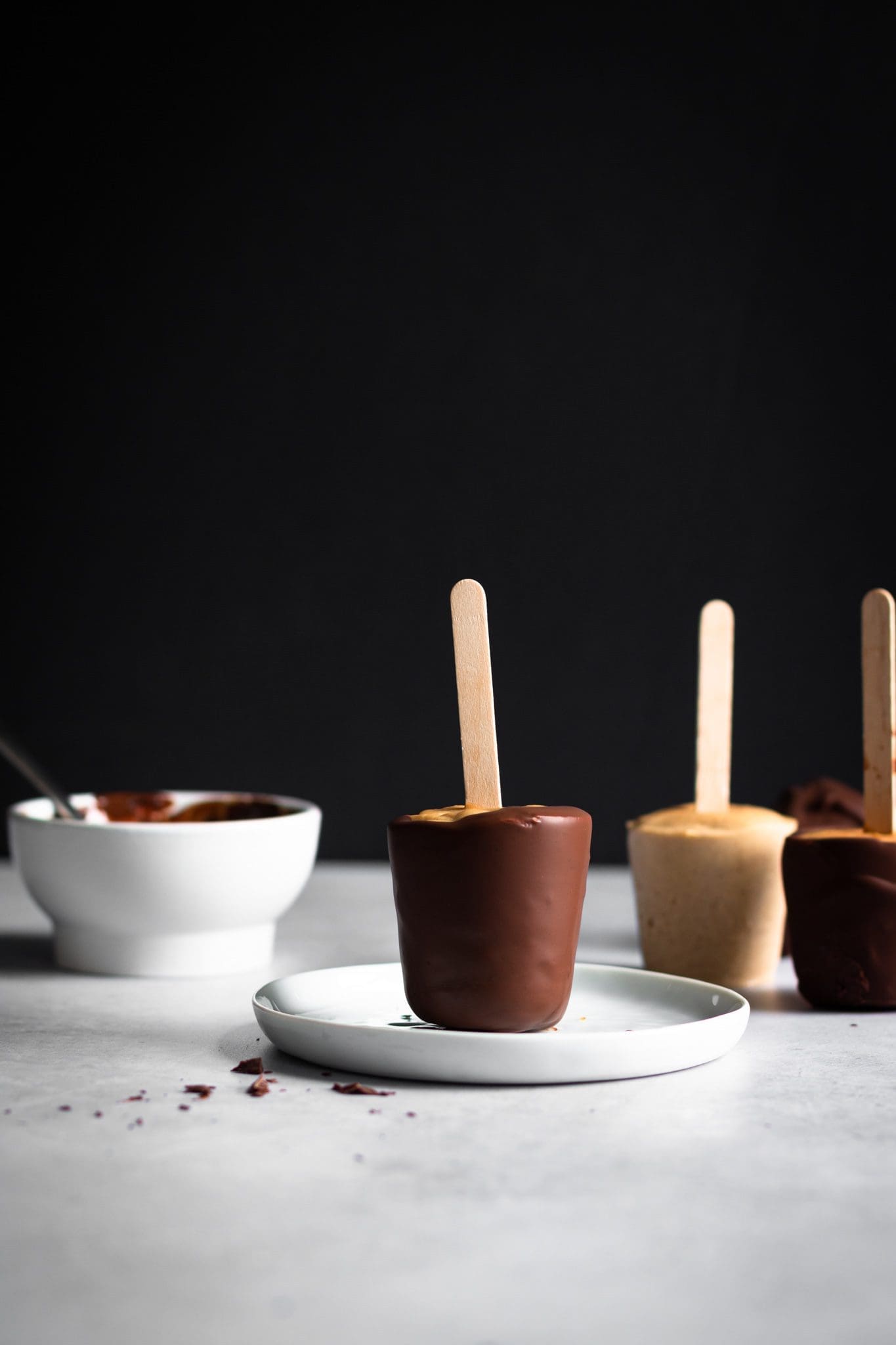 Chickpea Peanut Butter Ice Cream Pops covered in chocolate