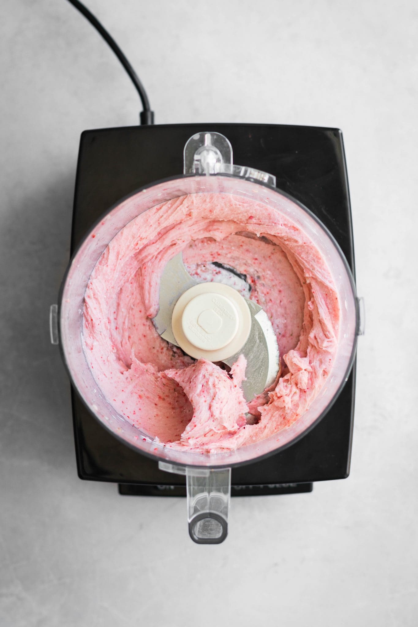 strawberry banana ice cream in a food processor