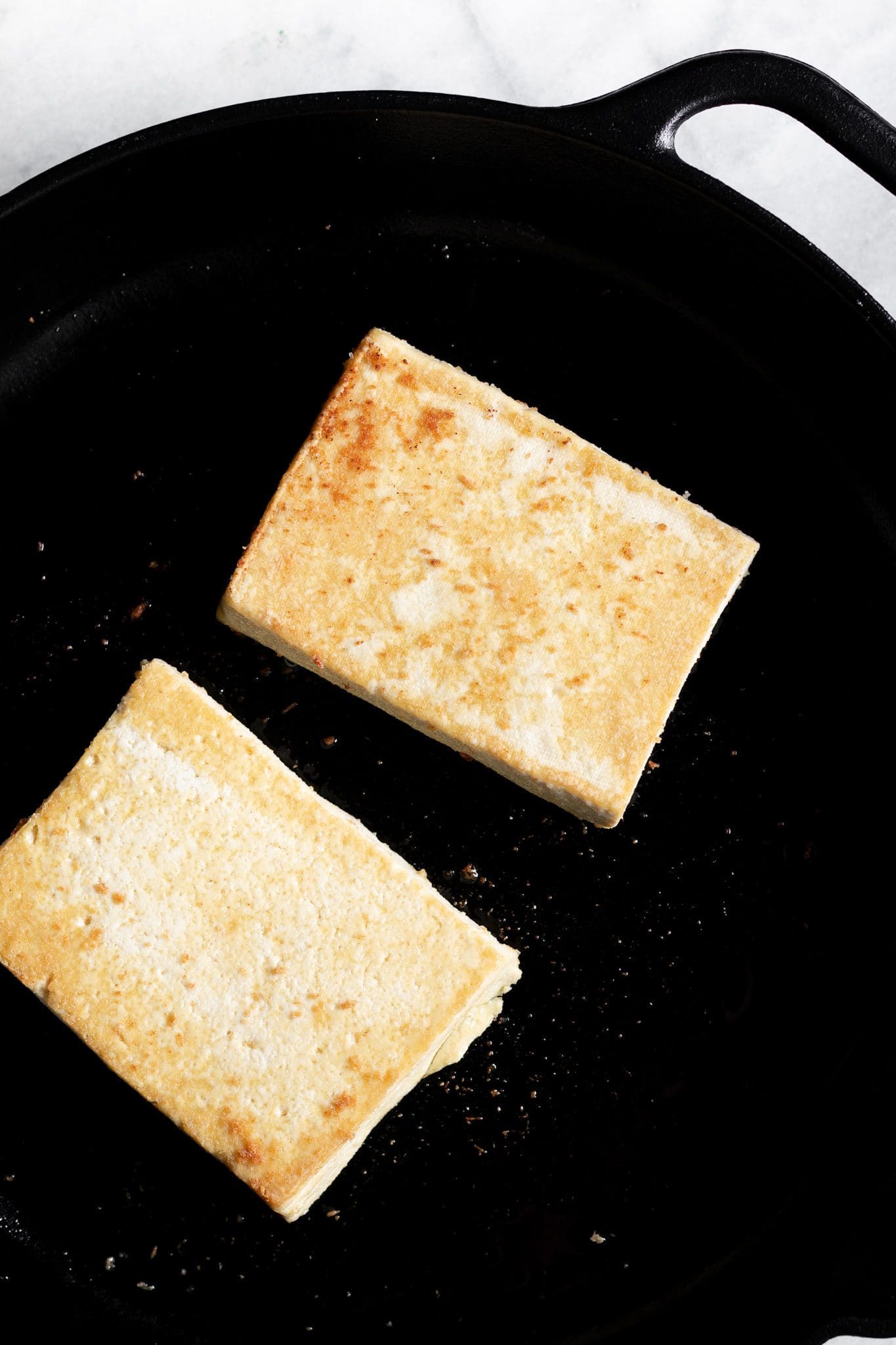 tofu on a cast-iron skillet