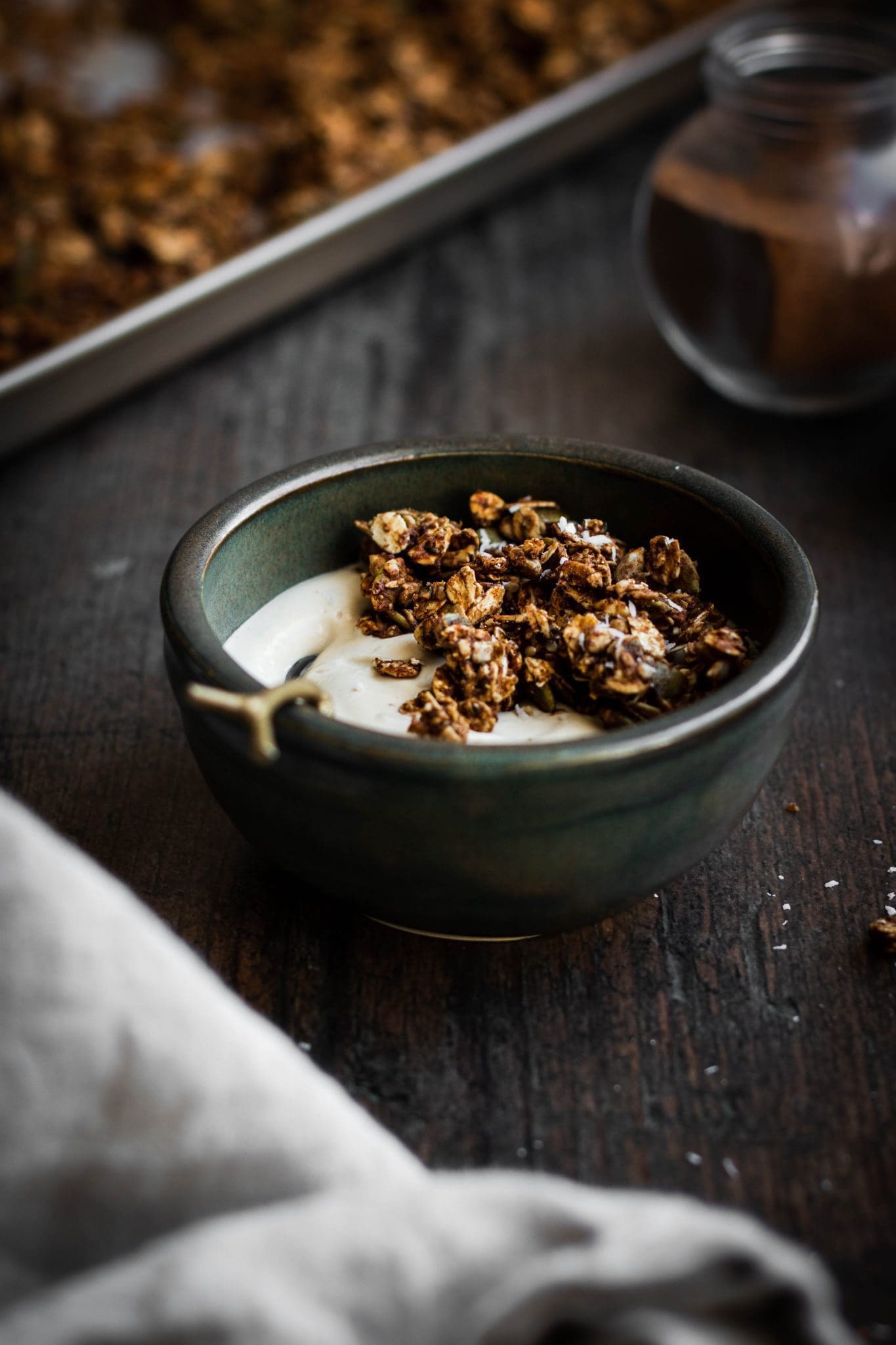 date-sweetened chai granola in a bowl from the side