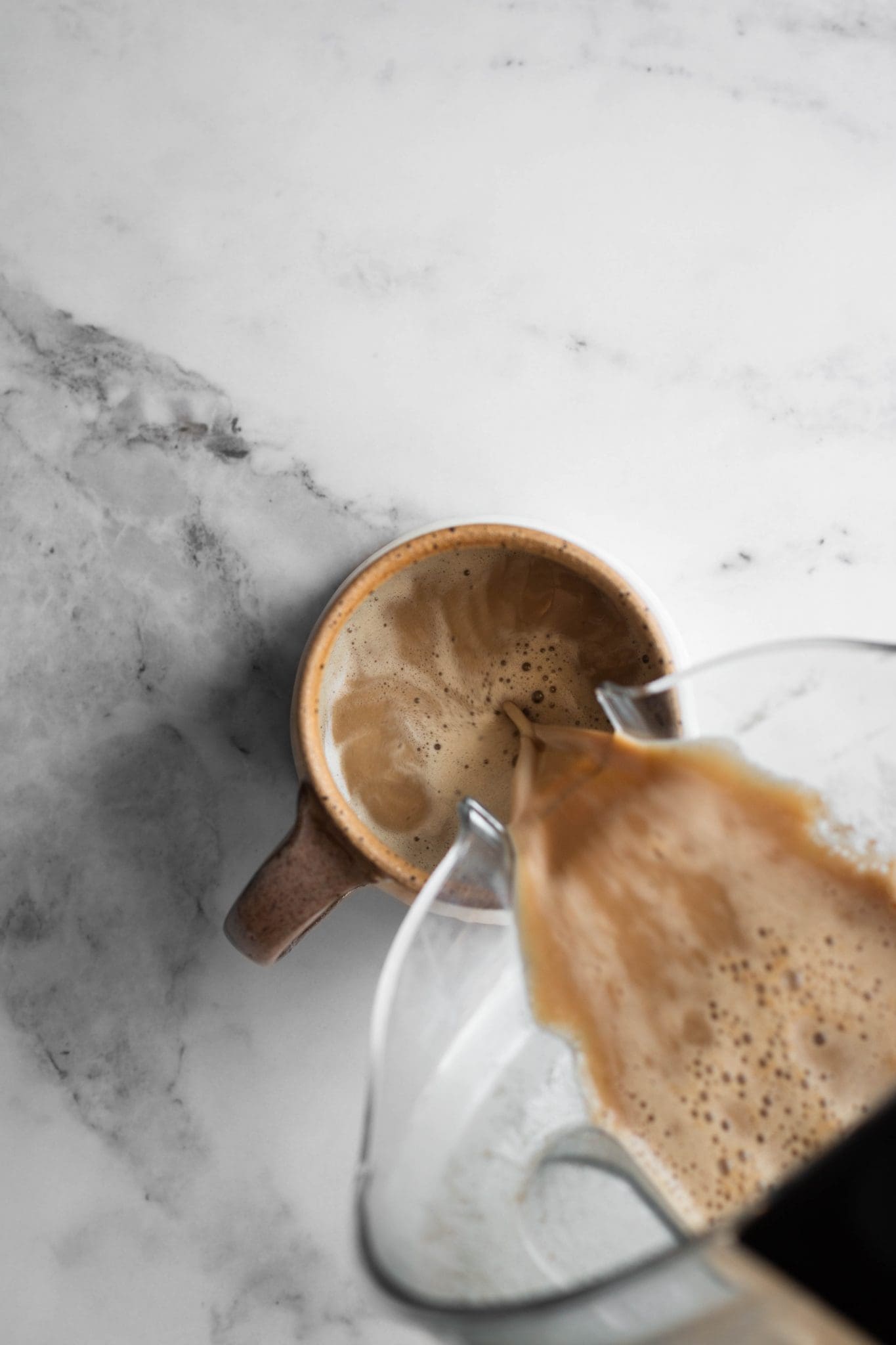 vegan salted caramel latte poured in a mug