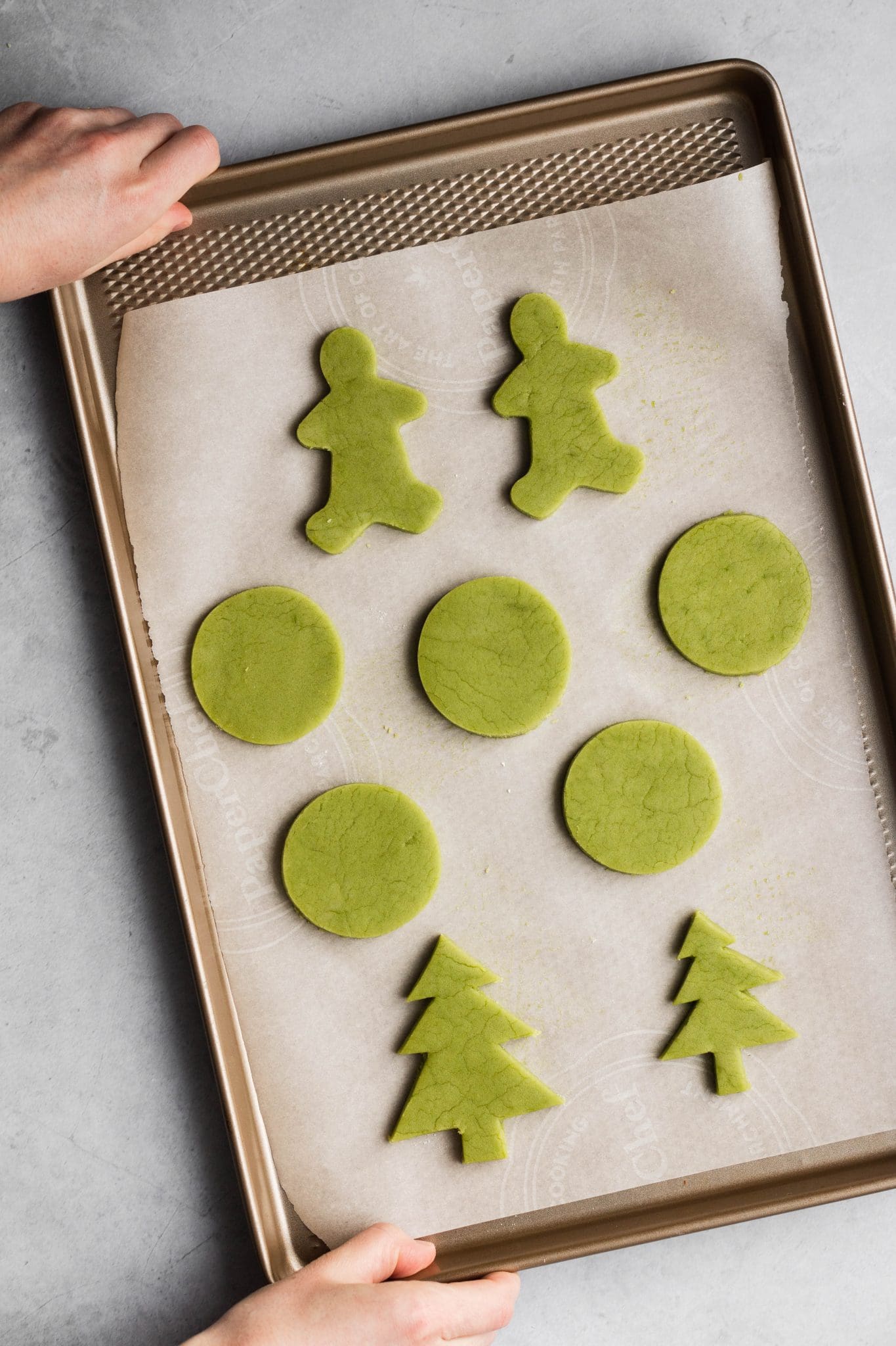 vegan matcha sugar cookies on a baking sheet
