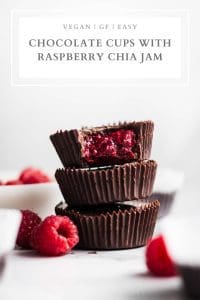 dark chocolate cups with raspberry chia jam pin