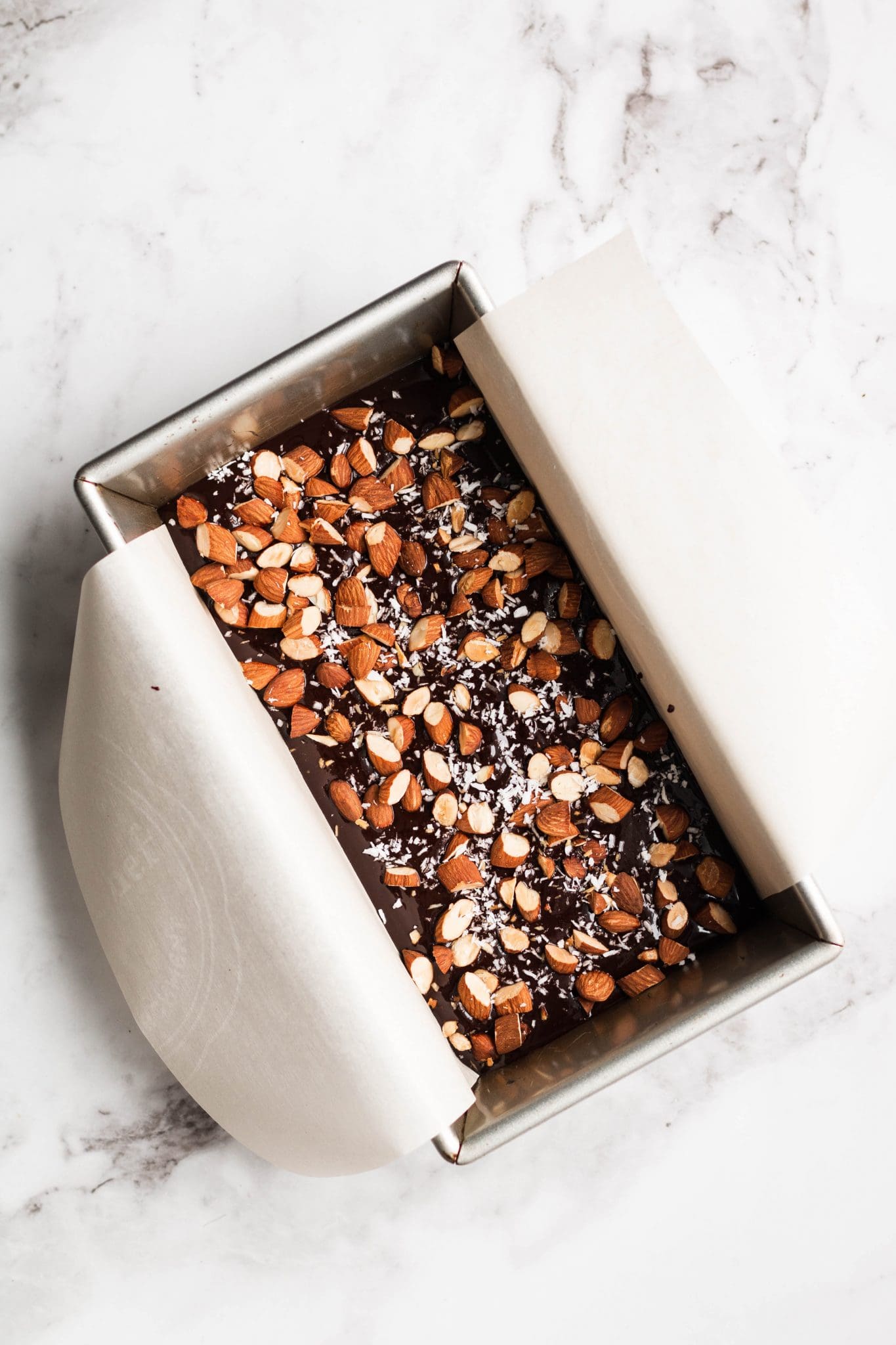chocolate almond freezer fudge in a loaf pan