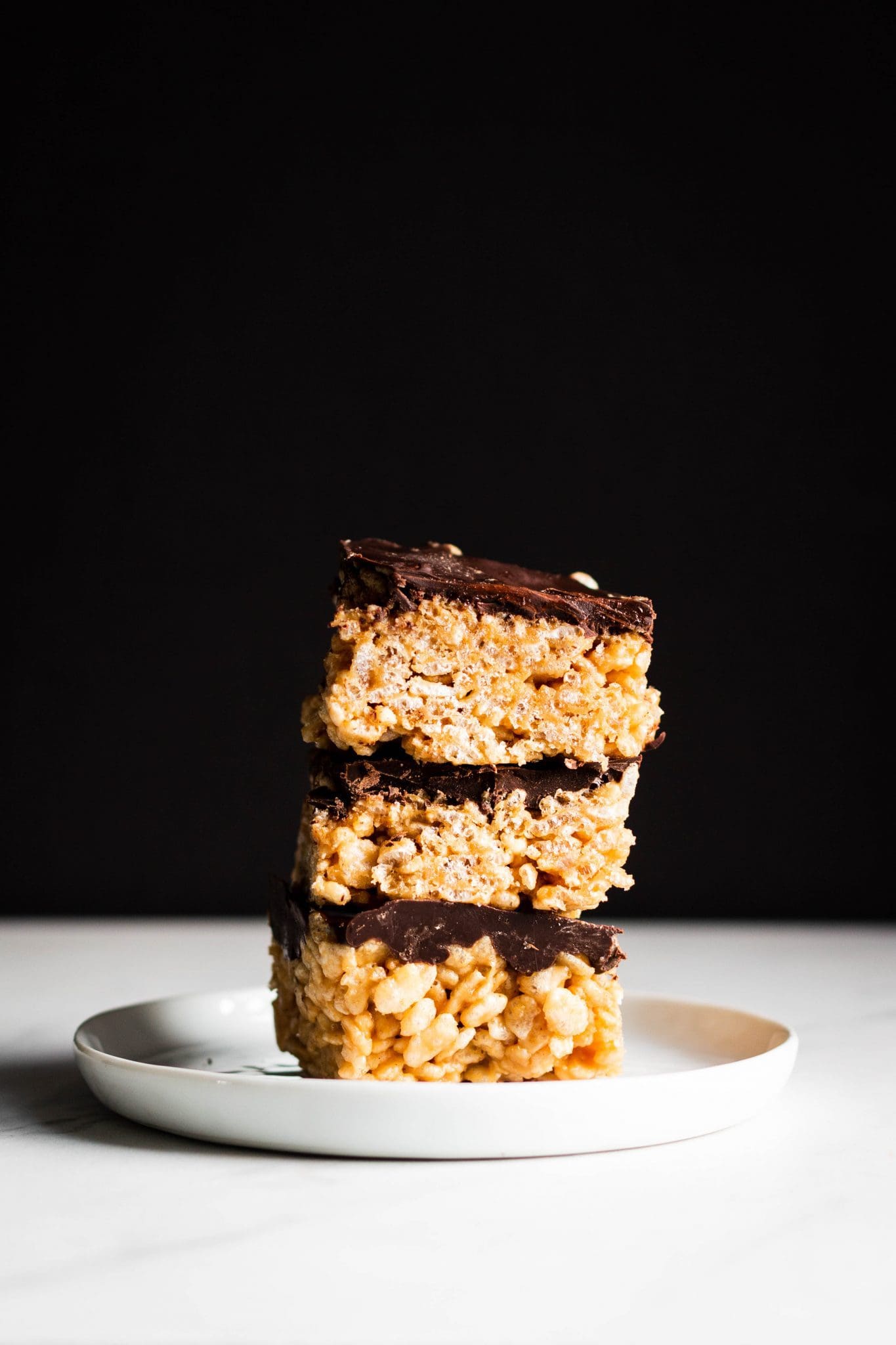 chocolate peanut butter rice krispie squares stacked