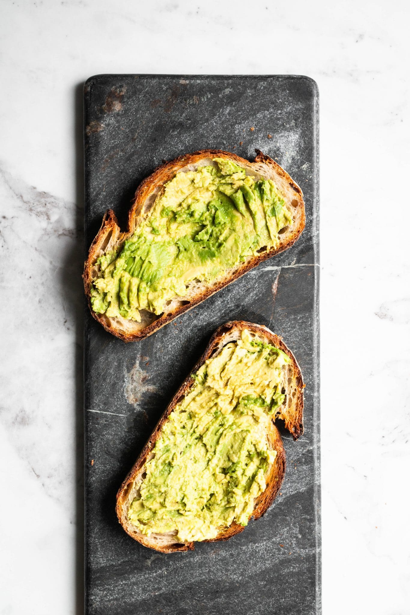sourdough bread with mashed avocado