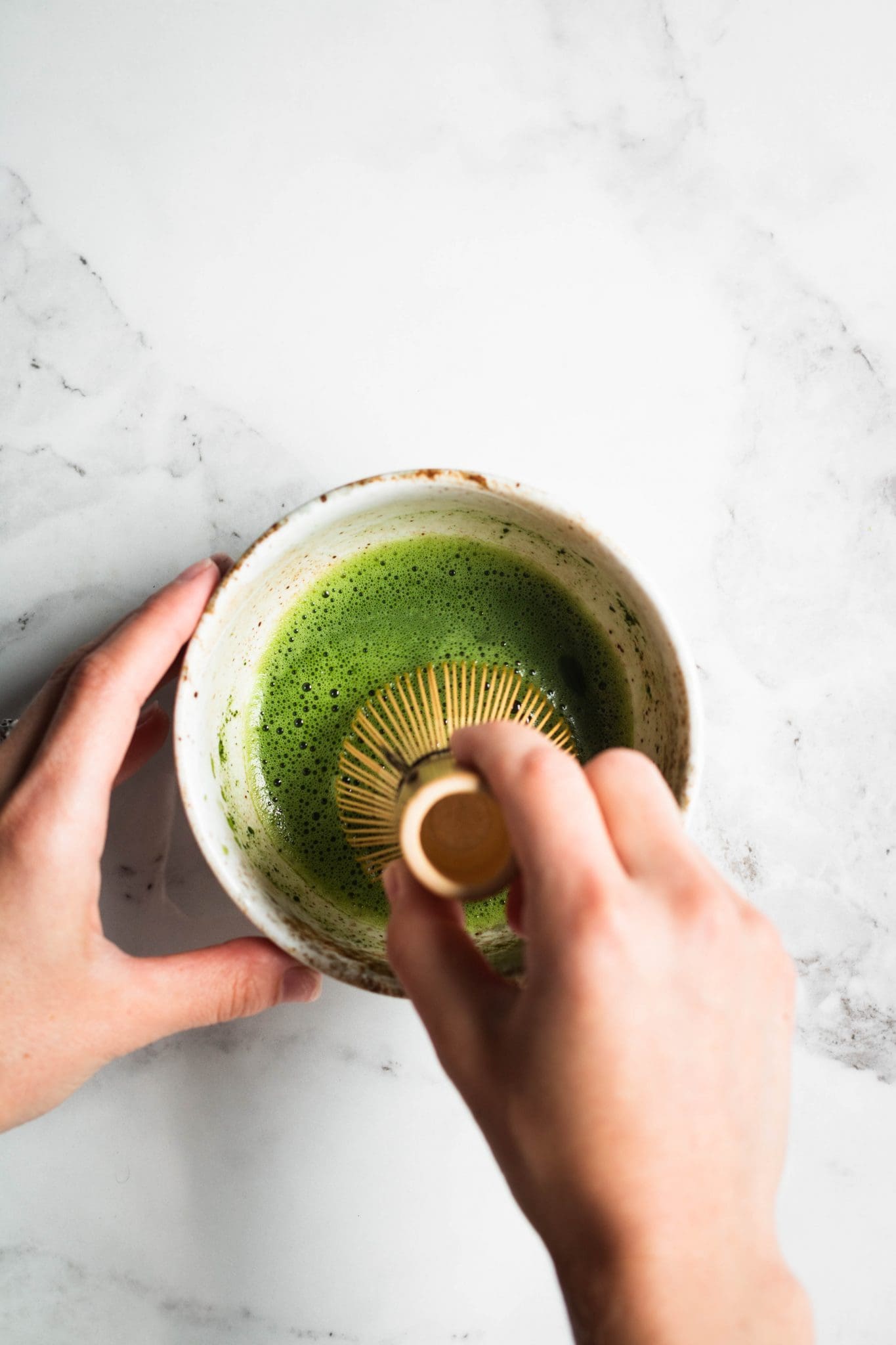 whisked matcha in a bowl