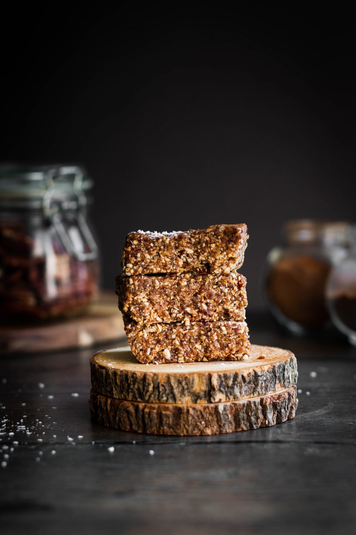 stack of three spiced pecan granola bars seen from the side