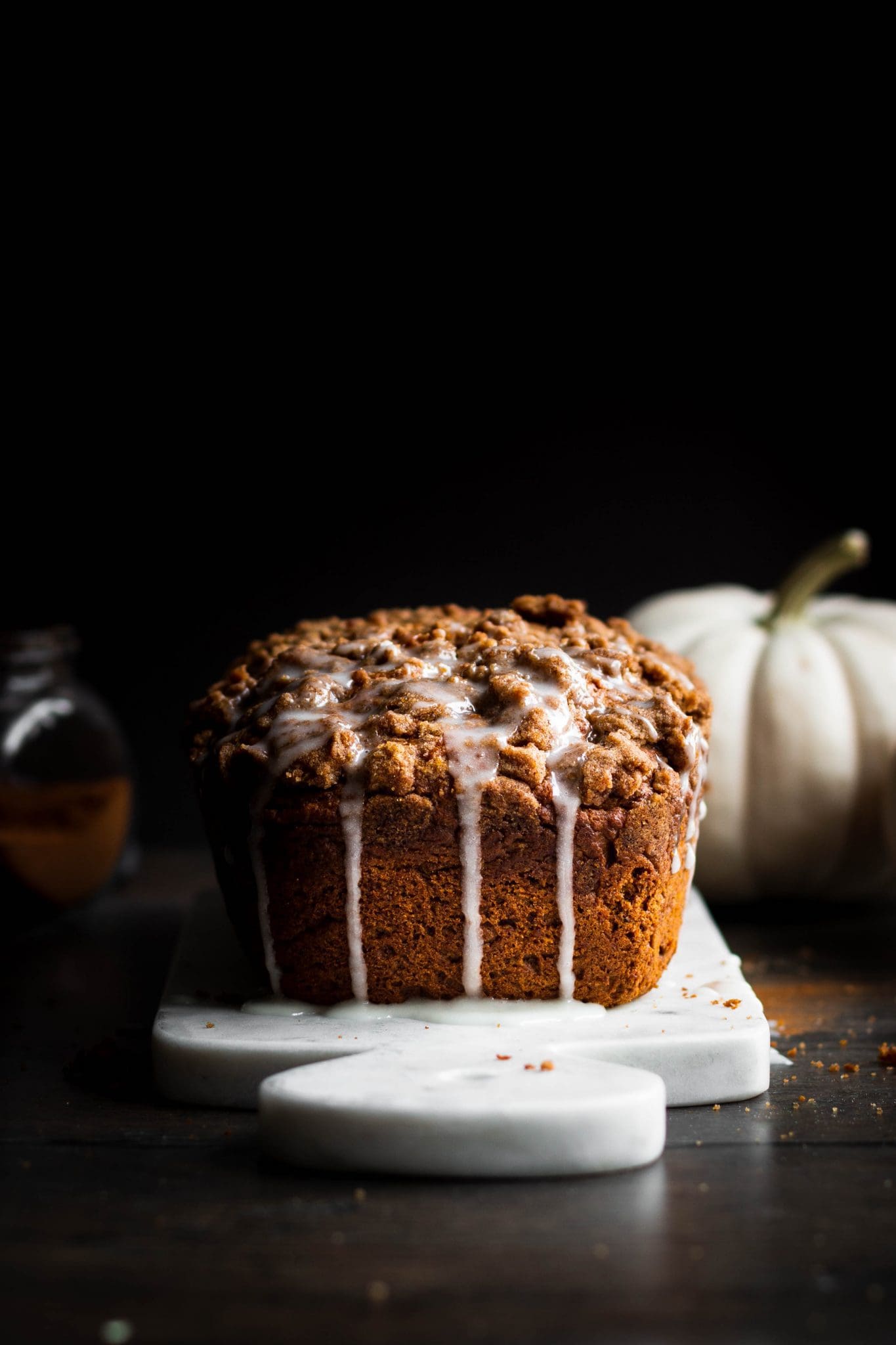 vegan pumpkin bread with streusel topping and icing