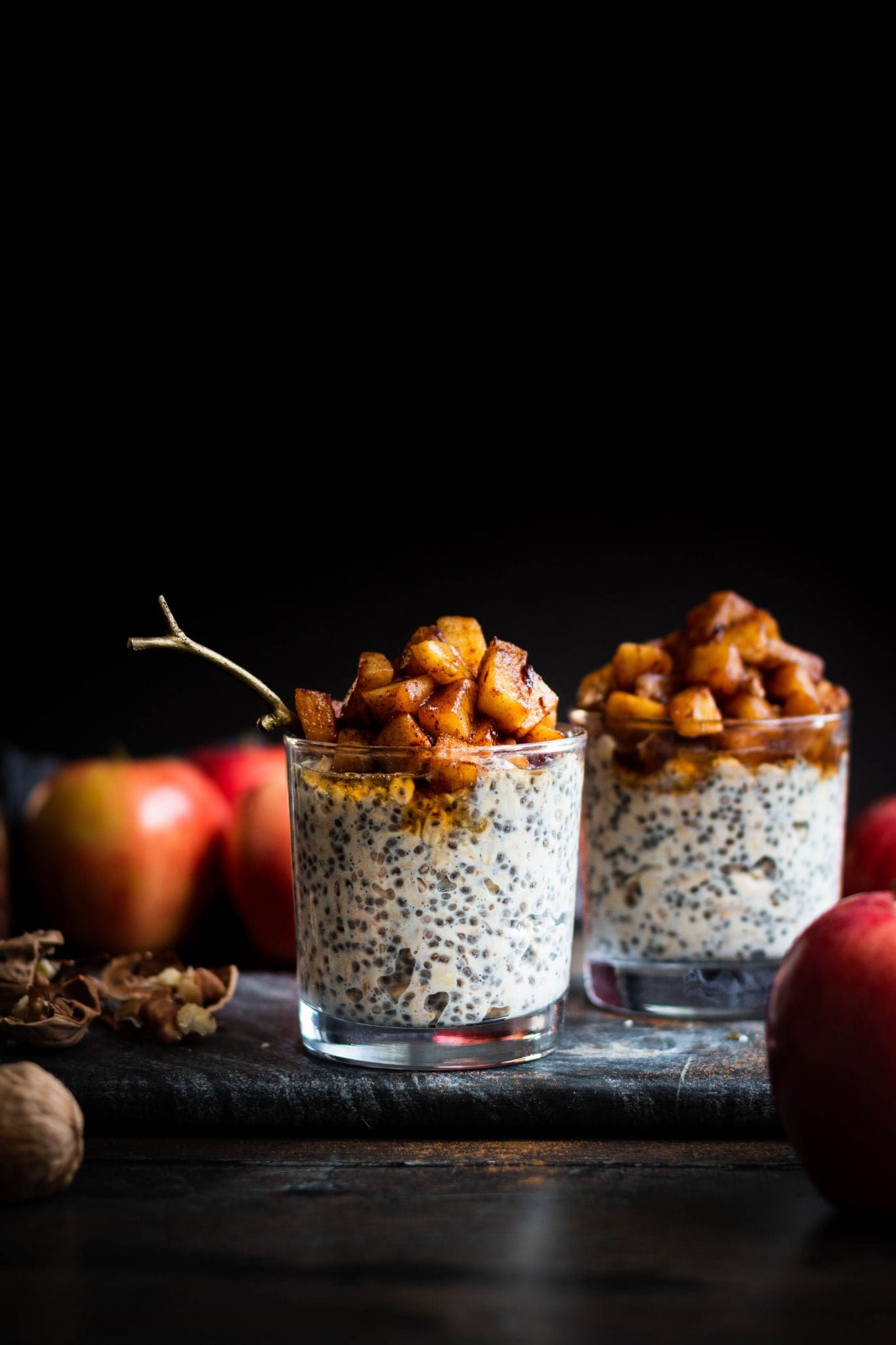 apple pie overnight oats in glasses, seen from the side