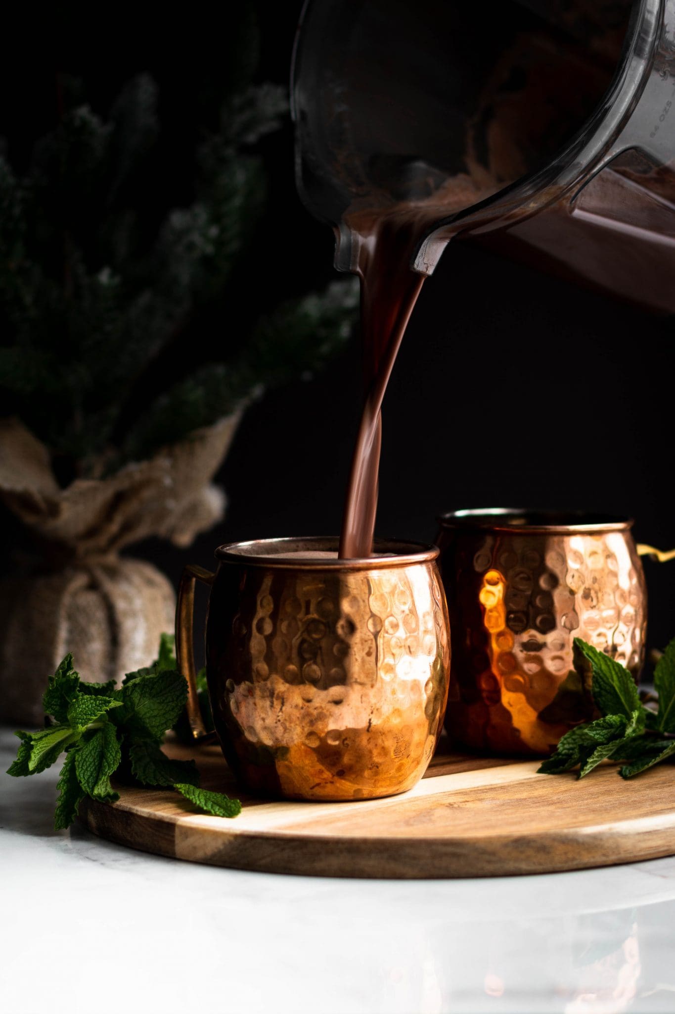 cozy blender drink poured in a copper mug