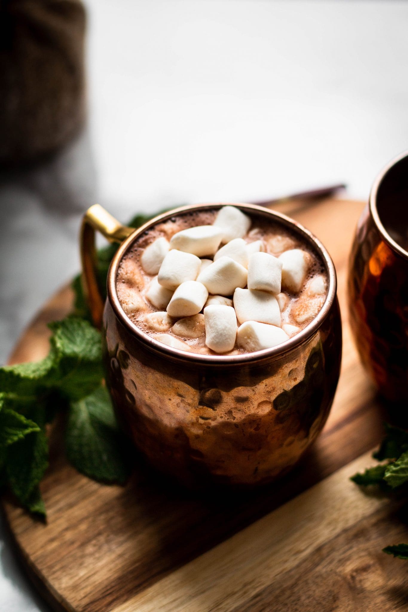 vegan peppermint mocha in a cup with marshmallows