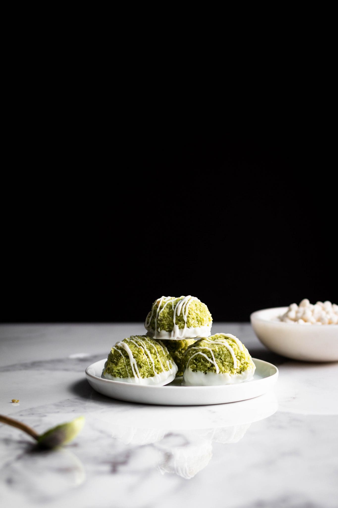 matcha coconut macaroons on a plate