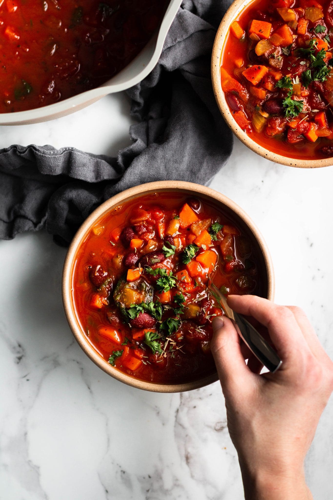 Italian bean & vegetable soup in bowls seen from the top