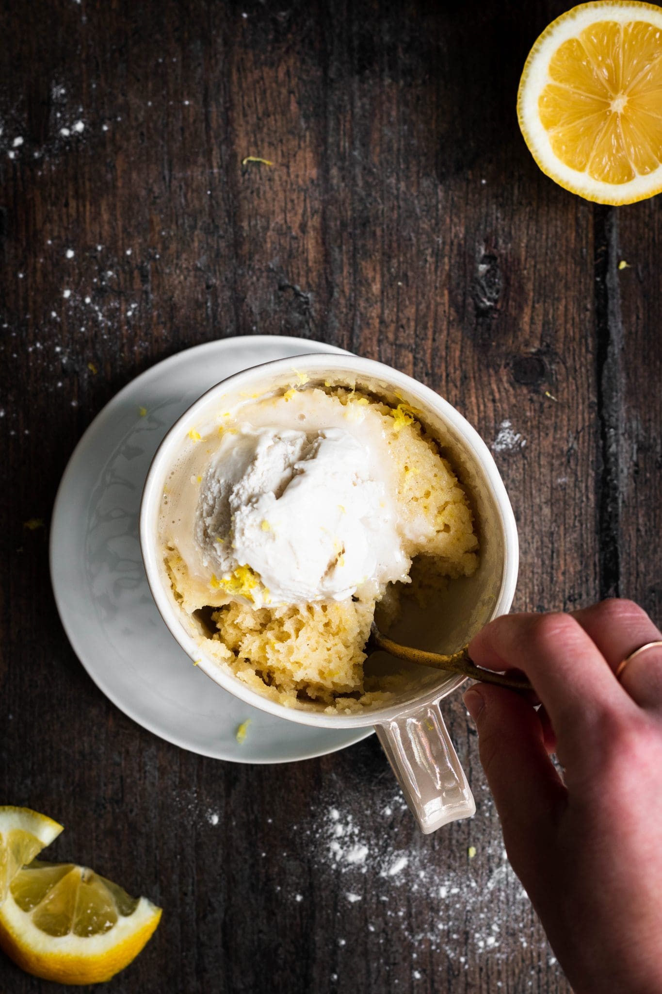 lemon mug cake with a spoonful taken