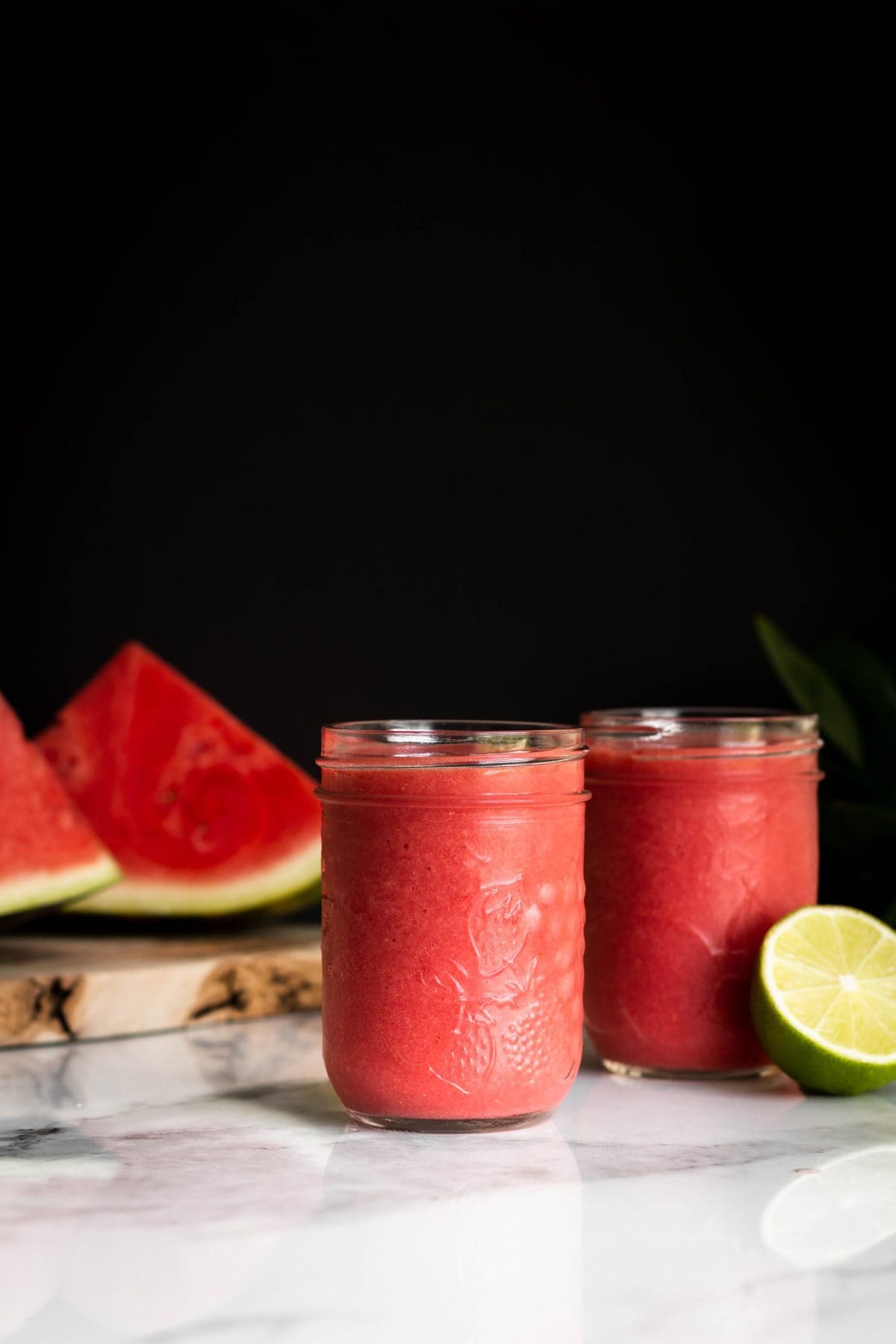 watermelon strawberry lime smoothie seen from the side