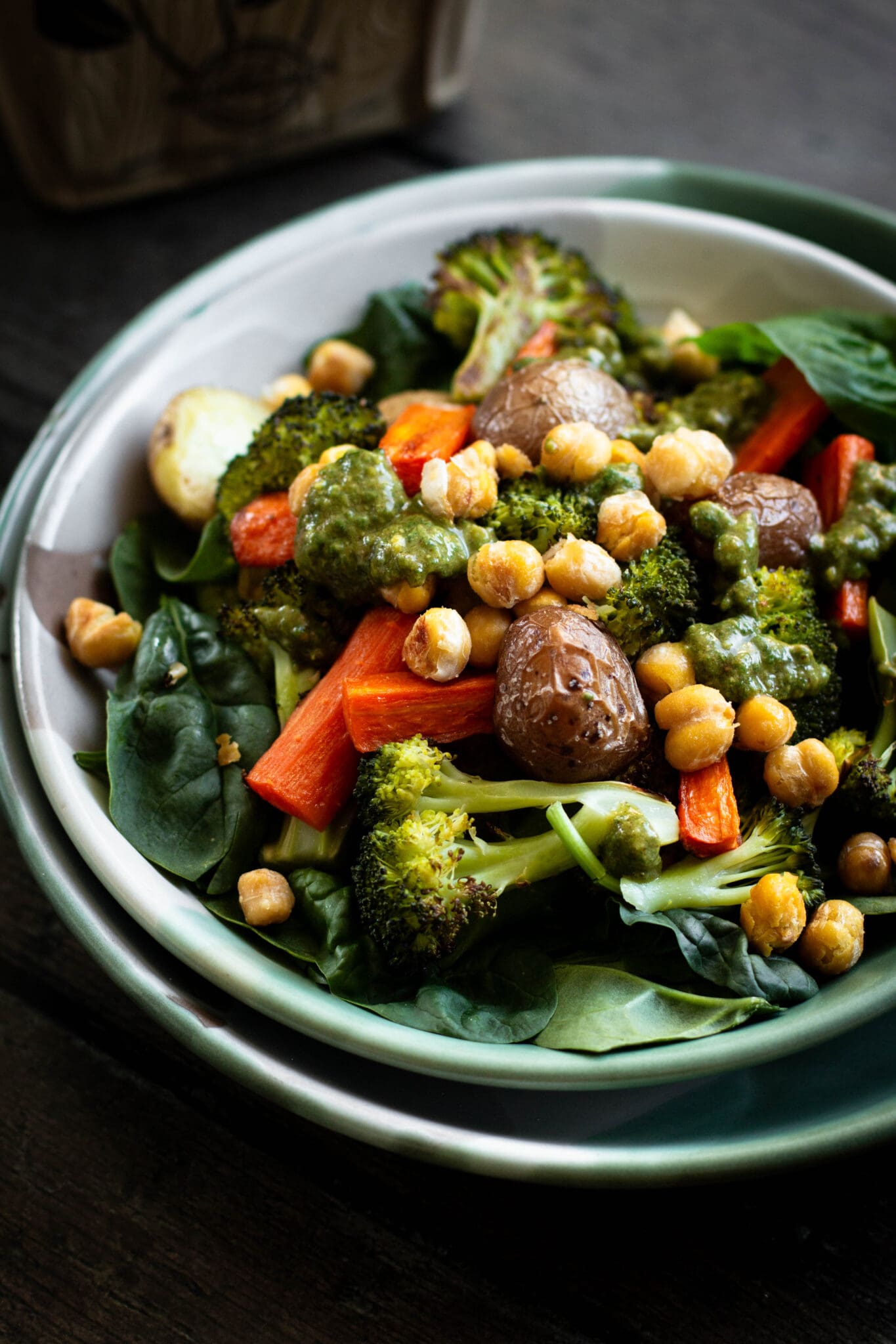 Roasted vegetable bowl with almond pesto closeup